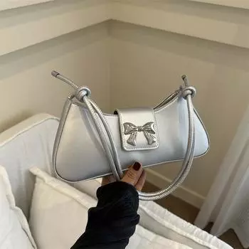 Французская мода нишевый дизайн женская сумка подмышкой 2024 корейская новая сумка-багет премиум-класса с бантом через плечо белый