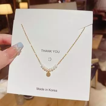 Французский сладкий темперамент Жемчужное ожерелье женский нишевый дизайн чувство улыбающееся лицо кулон ожерелье новая ключичная цепочка