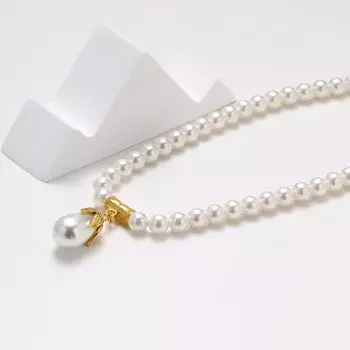 French elegant niche retro design imitation Shijia pearl necklace women s irregular splicing water drop pendant collarbone chain