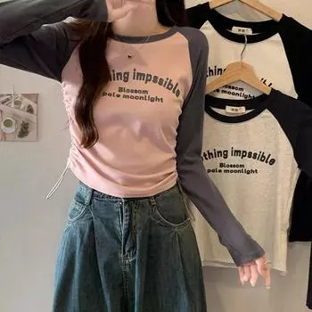 Футболка с длинными рукавами и принтом в виде американских букв, контрастными цветными рукавами реглан, талией из чистого хлопка на завязках и топом, омолаживающим кожу, на осень S