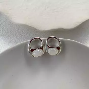 Геометрические овальные серьги-пусеты Женская мода Темперамент Высокий уровень Дизайн холодного ветра Серьги Простые Полые Французские