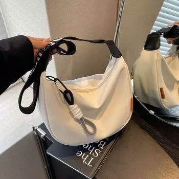 German Nylon Cloth Bag Women 2025 New Fashion Popular Shoulder Dumpling Bag All-Match Niche Shoulder Commuter Bag White spell Black