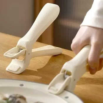 Главная Кухня Противоожоговый противоожоговый зажим для посуды Силиконовый зажим для подъёма тарелки Нескользящий зажим для тарелки Зажим для пароварки для овощей на пару 1pc бежевый