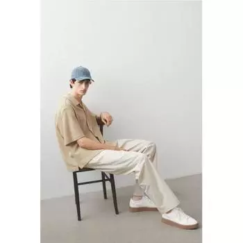 Рубашка свободного кроя с вафельной текстурой и воротником-стойкой HM бежевого цвета XS