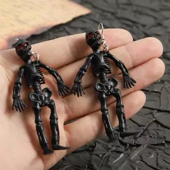 Хэллоуинская коллекция преувеличенных сережек с черепами из смолы имитирует глаза сексуального демона 1