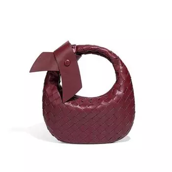 Hand-woven Croissants Are Fashionable and Versatile. They Are Portable Women s Bags with A Casual and Retro Texture