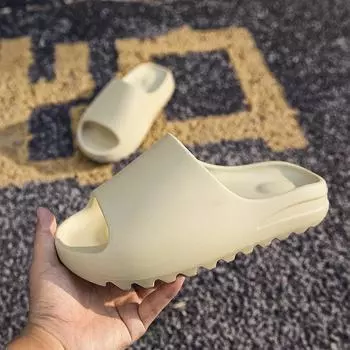 Haolang 2025 новые тапочки из кокоса летние для дома и улицы, ощущение наступания на дерьмо толстая подошва одно слово перетаскивание внешняя торговля женская пара мужская обувь 35