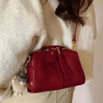 Hong Kong Genuine Leather Boston Satchel Pillow Bag Women s 2025 New Crossbody Ladieswear Red Bridal Wedding Bag Red doll ornaments