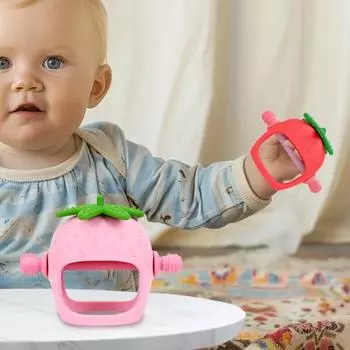 Игрушка для прорезывания зубов у детей от 0 до 24 месяцев. Облегчает боль в деснах с помощью прорезывателя в форме клубники. Игрушка для облегчения прорезывания зубов из пищевого силикона, легко моется. розовый