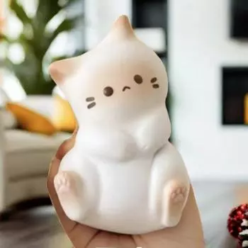 Игрушка-котенок из прессованной пластмассы с функцией щипка и музыки - игрушка-декомпрессионистка с медленным отскоком белый