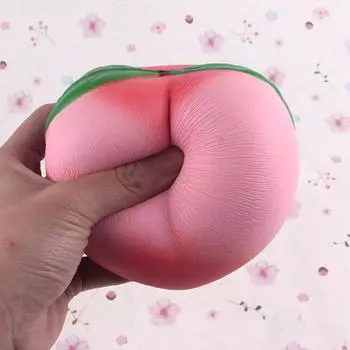 Игрушка-подвеска в виде персика антистресс 10см с мягким кремовым ароматом для медленно растущих детей 1