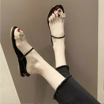 In the summer of 2025, the new one-word drag rhinestone outer wear toe sandals flat bottom inner height increase slope heel beach sandals women 35