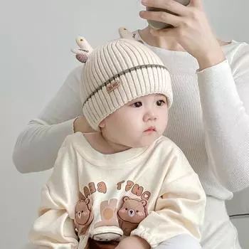 Infant hats Winter warm and windproof knitted pullover hats Small month-old baby newborn protective door wool hats