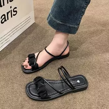 Интернет знаменитости супер огонь крутые тапочки женская летняя одежда 2025 новая мода фея ветер плоский пляж с юбкой сандалии 35