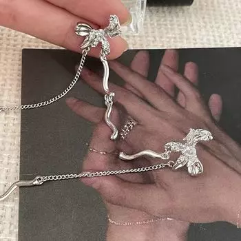 Irregular antique bow stud earrings women s unique design sense super fairy fringed earrings fresh and fashionable zircon earrings copper