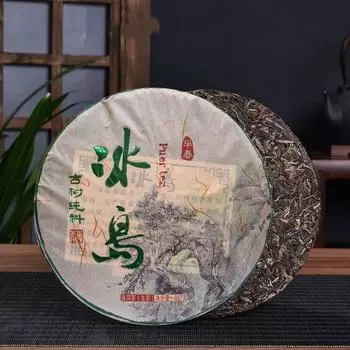 Исландия старое дерево старый бан Чжан чай блин 357 г Юньнань семь блинов чай 18 лет Пуэр чай сырой 357g