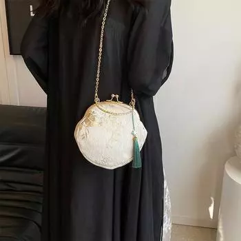 Изысканная сумочка, полная китайского очарования, элегантности и торжественности, элегантного и роскошного темперамента, ощущения высокого качества.