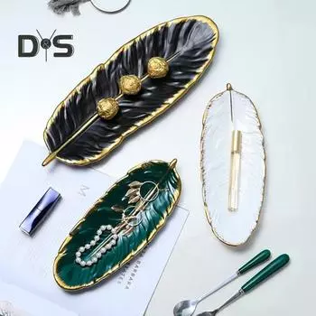 Изысканная тарелка. Стильная фарфоровая тарелка для еды в форме креативного пера. Small