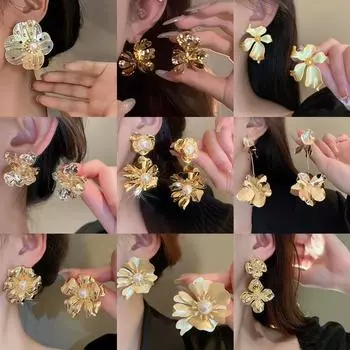 Изысканные и блестящие серьги, модные и утрированные, атмосферные серьги, банкетная легкая роскошь и серьги высокого класса.