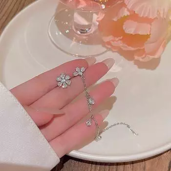 Изысканные серьги-кисточки с цветком из циркона - для женщин null