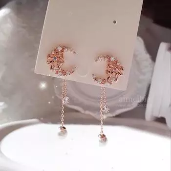 Изысканные серьги с лентой и луной – розовое золото розового золота