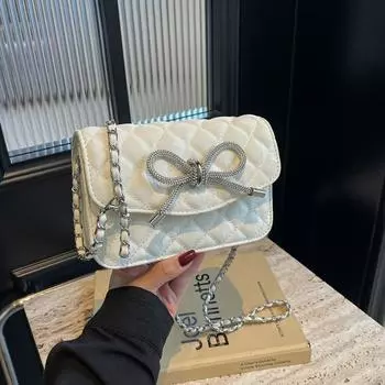 Изысканный однотонный небольшой рюкзак из искусственной кожи, декорированный бантом, обеспечивающий комфорт и высокий уровень комфорта.