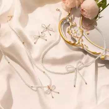 J.ESTINA Mariel Ribbon Pearl Bead ожерелье – элегантный жемчуг с женственным ленточным штрихом