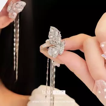 Элегантная сережка-кафф с кисточкой в виде бабочки из циркония — универсальный, модный аксессуар высшего класса. chain tassel серебряный