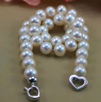 Элегантное круглое ожерелье из натурального белого жемчуга Южного моря диаметром 10-11 мм.