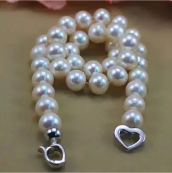 Элегантное ожерелье из натурального белого жемчуга Южного моря диаметром 10-11 мм и круглой формы длиной 18 дюймов.