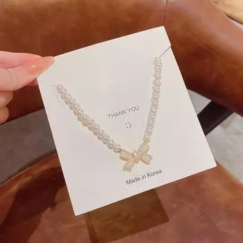 Элегантное ожерелье с легким бантом и жемчугом на ключицу для женщин X901 золотой