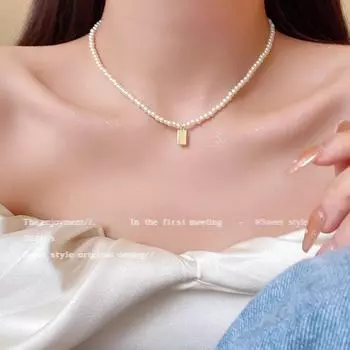 Элегантное жемчужное ожерелье с золотой биркой — универсальное и стильное украшение для ключицы X1431 золотой