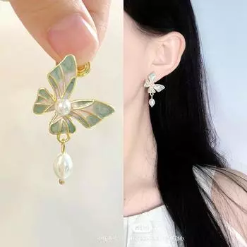 Новое поступление масляных серег с жемчугом и бабочкой белый