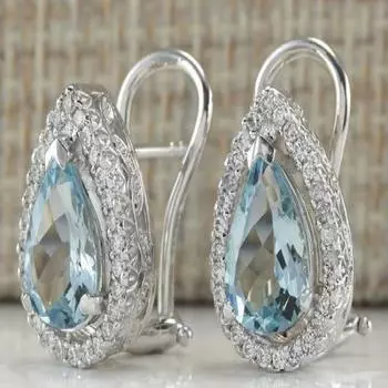 Ювелирные изделия бренда овальные синие серьги-гвоздики со стразами серебряного цвета