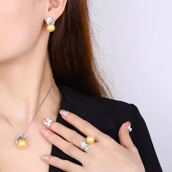 Ювелирные изделия шампанское золото жемчужный кулон любовь циркон жемчужное ожерелье s925 серебряные иглы жемчужные серьги-гвоздики кольцо