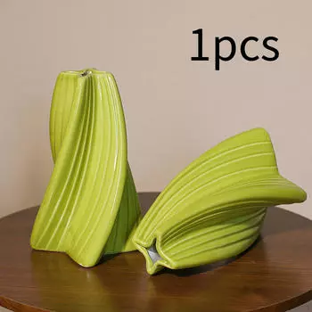 Керамическая ваза как центральный элемент столовой и гостиной зелёный