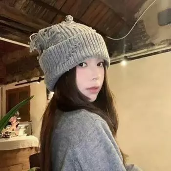 Knitted personalized hole wool hat autumn and winter loose warm cold hat new fashion stacking hat literary and leisure M56-58cm чёрный