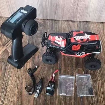 КНР 1/18 Радиоуправляемая машина 4WD Rock Crawlers 4x4 Вождение автомобиля Мини Настольный альпинистский автомобиль с дистанционным управлением Внедорожник Игрушка