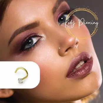 KODY PIERCING Изогнутый стержень из 14-каратного золота и циркона диаметром 1,5 мм.