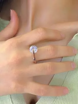 Кольцо ручной работы из серебра 925 пробы с вращающимся цирконом специального дизайна