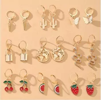 Комбинация из 9 пар сережек с фруктами, животными, землей и замками золотистый