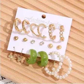 Комбинация из 9 пар запонок с жемчужным камнем и сережек-колец золотистый