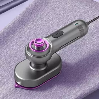 Компактный вращающийся ручной электрический утюг зелёный