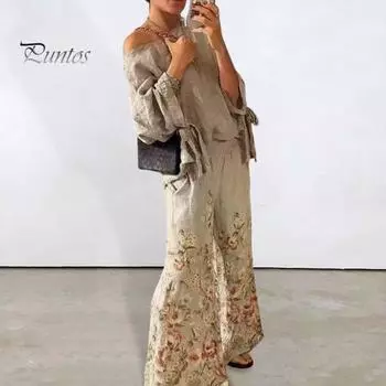 Комплект из 2 предметов: топ и брюки, одно плечо, косой вырез, рукав три четверти, шнуровка на манжетах, блузка с цветочным принтом, эластичные широкие брюки с высокой талией M светло-серый