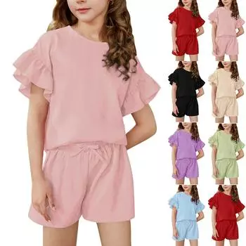 Комплект из двух предметов: легкий однотонный повседневный спортивный топ с оборками, короткими рукавами, круглым вырезом и шортами для детей среднего и младшего возраста на лето 120
