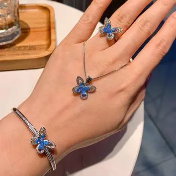 Комплект из трех частей «Браслет, ожерелье, кольцо, серьги» с бриллиантами «Бабочка» от Sea Blue