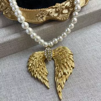 Комплект украшений «Золотое перо, бриллиантовая брошь», комплект ожерелий «Шицзячжу»