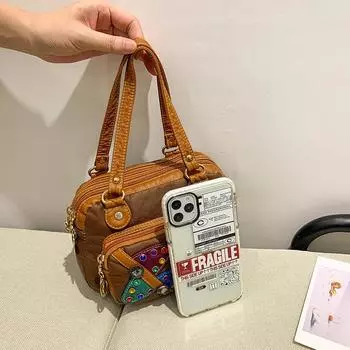 Контрастная цветная маленькая сумка Необычная цветная заклепочная женская сумка в стиле пэчворк Niche Design Sense Персонализированная женская сумка через плечо