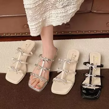 Korean version of flat-bottomed niche design foreign-style versatile sandals women s 2025 new summer sweet bow rhinestone Roman shoes 35 серебряный