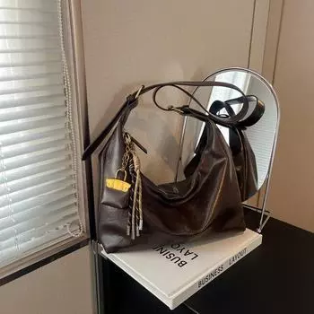 «Корейская сумка-мешок через плечо в стиле ретро, вместительная, универсальная, 2024 года» brown. 31*13*27 коричневый